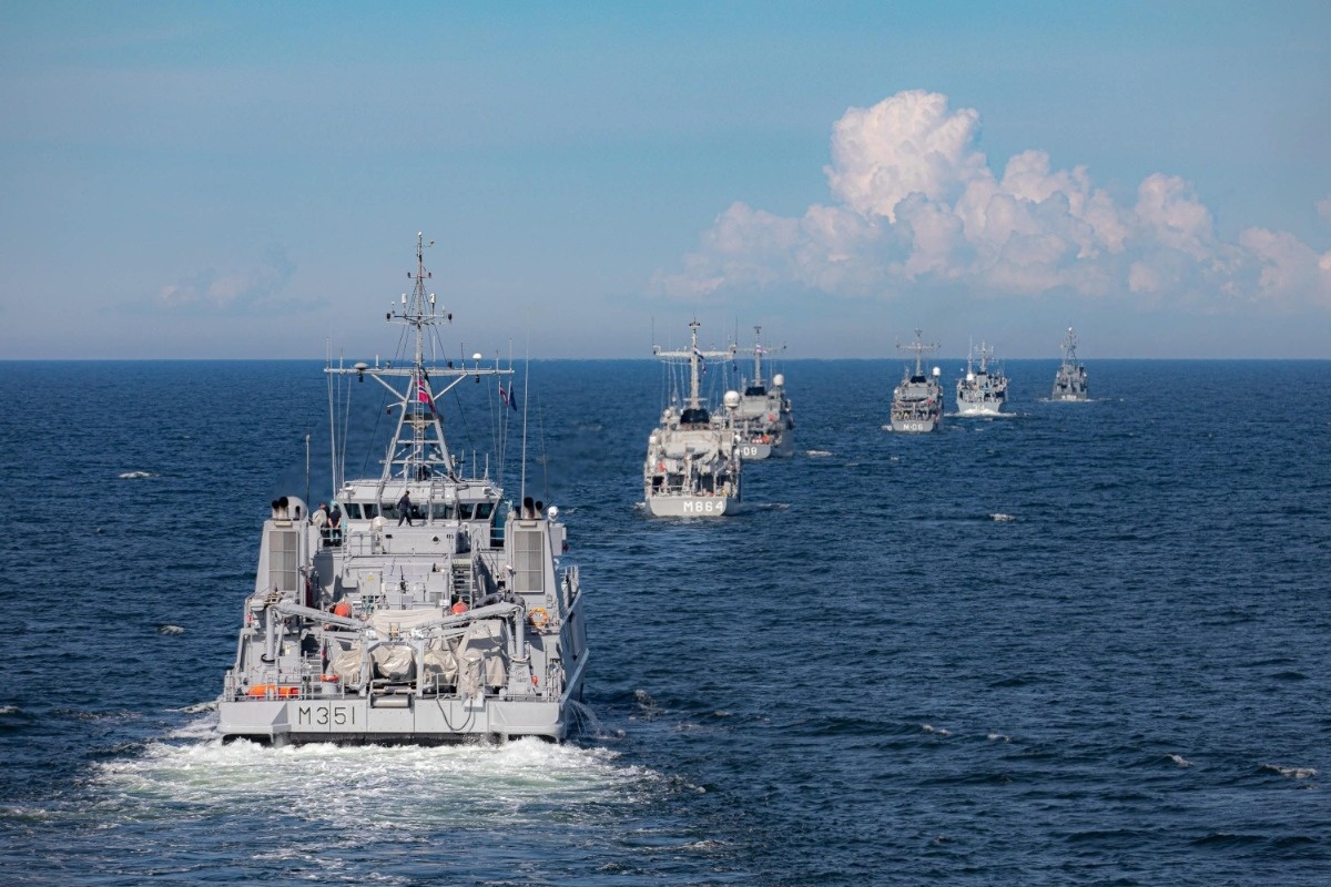 Welcoming formation during Open Spirit 2020. The exercise gathers 10 ships from five nations (Latvia, Estonia, Germany, Netherlands and Norway). In the forefront HNoMS Otra and HNLMS Willemstad, followed by several Latvian, Estonian and German vessels on 4 May 2020 near the Latvian coast / Picture: NATO